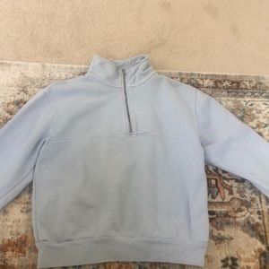 Half zip light blue pull over